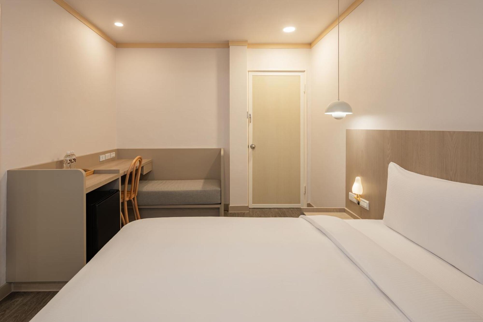 Kindness Hotel - Tainan Minsheng Номер фото