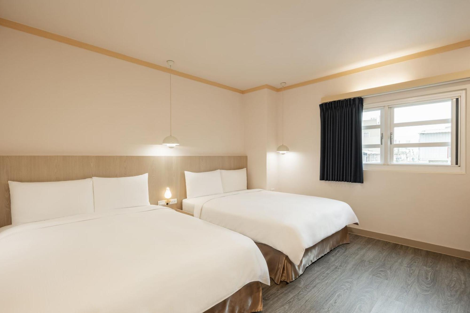 Kindness Hotel - Tainan Minsheng Номер фото