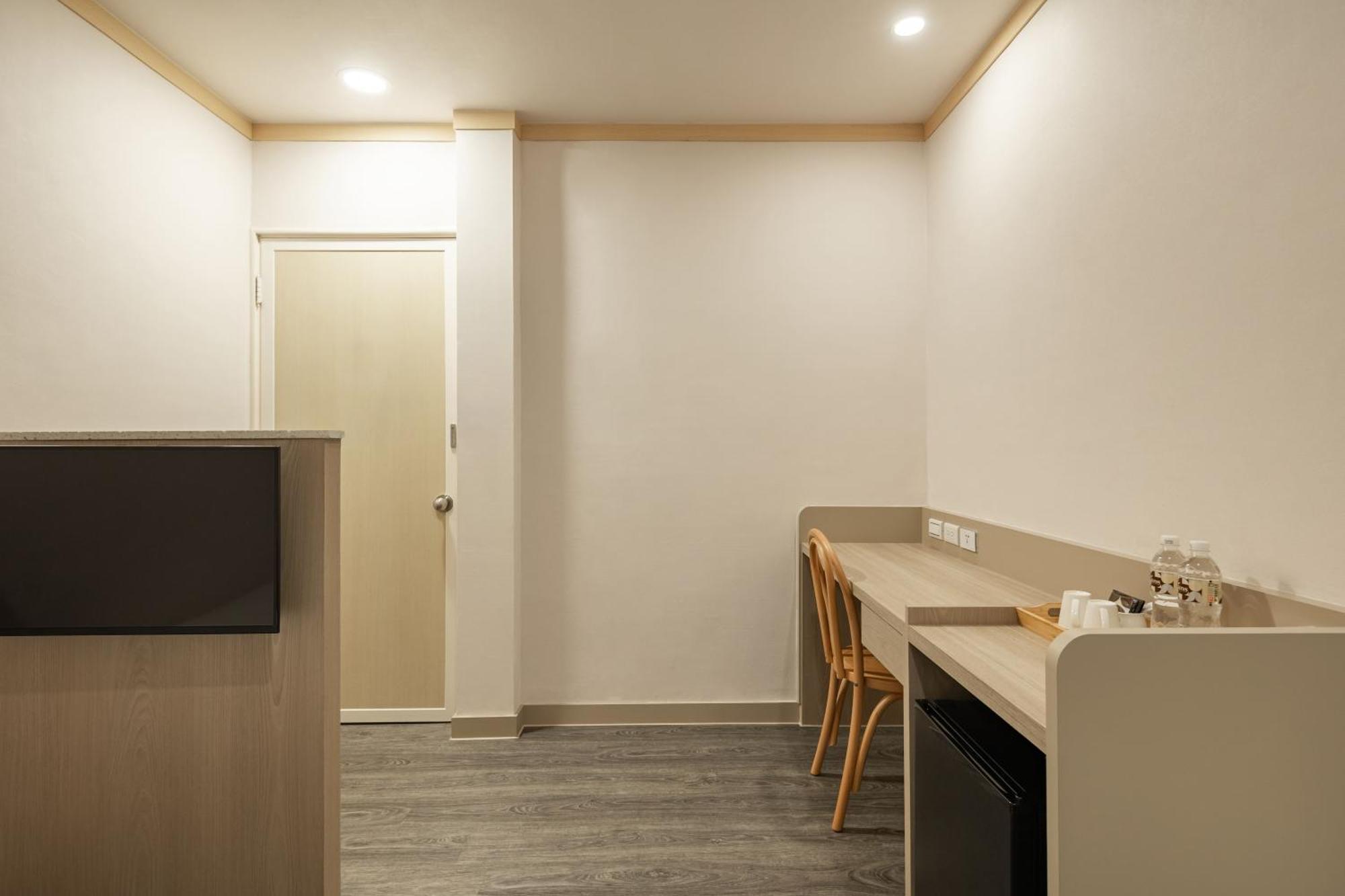 Kindness Hotel - Tainan Minsheng Номер фото