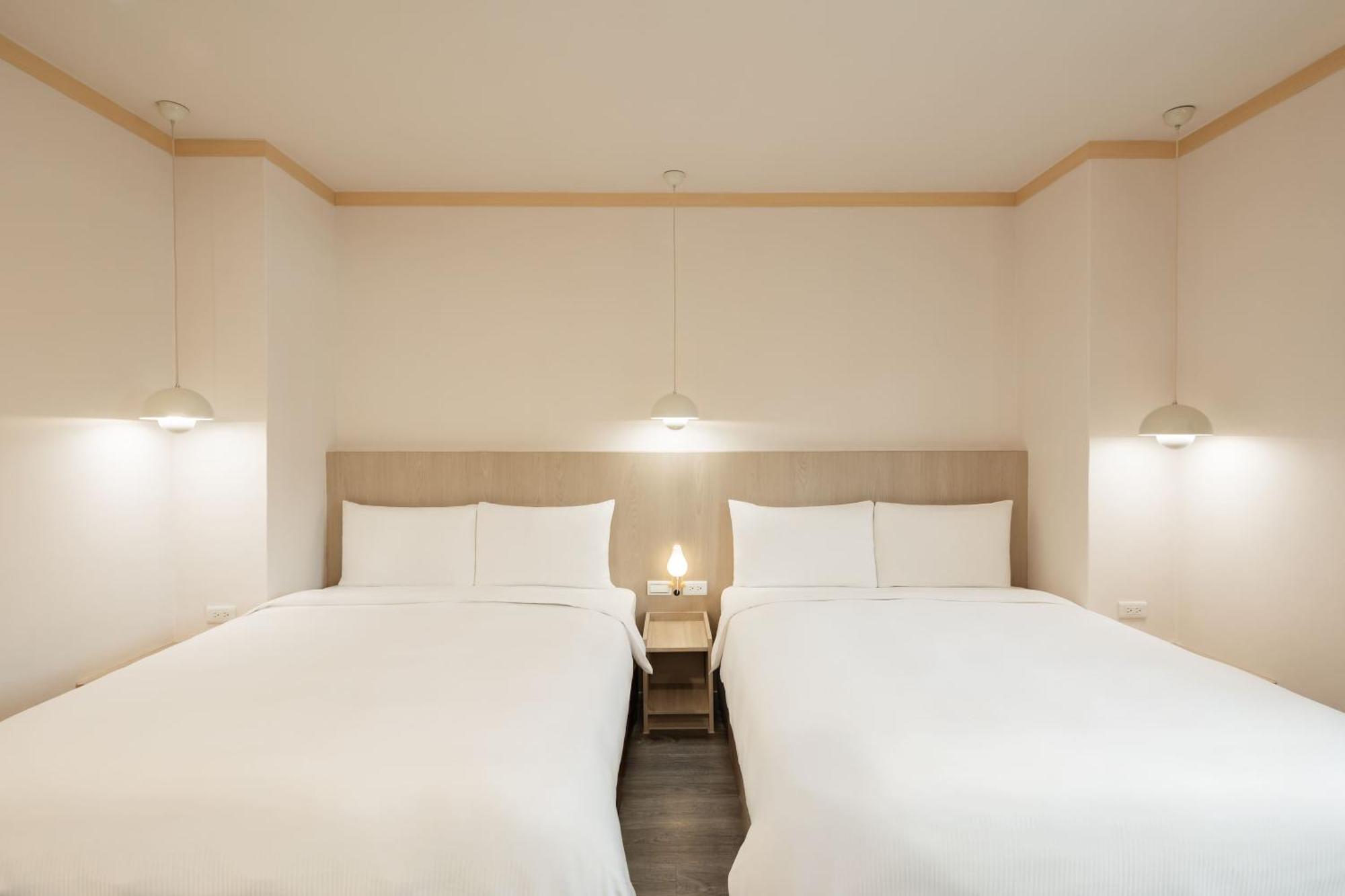 Kindness Hotel - Tainan Minsheng Номер фото