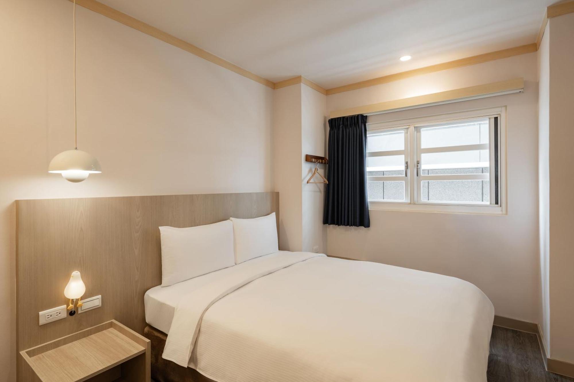 Kindness Hotel - Tainan Minsheng Номер фото