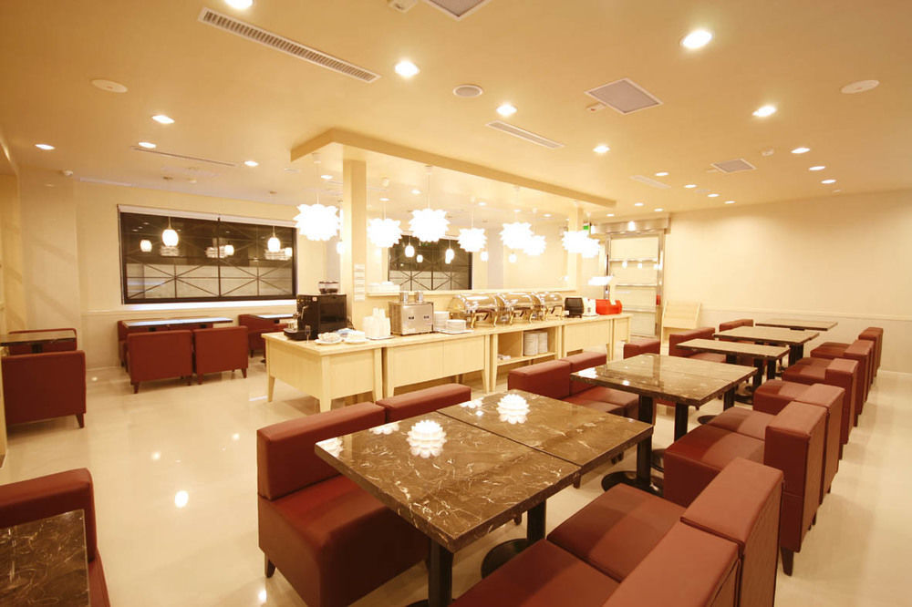 Kindness Hotel - Tainan Minsheng Екстер'єр фото